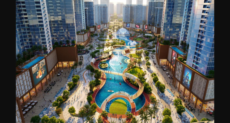 Tiger Downtown Ajman lagoon-front community aerial view — Orchid Towers